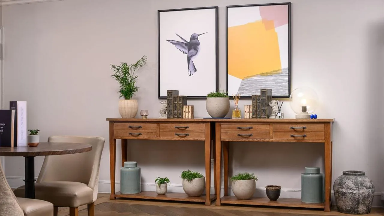 Wooden table with plants inside the Oxford hotel's lounge